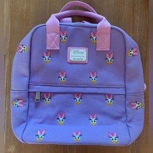 Never used - Daisy Duck Disney lounge-fly backpack